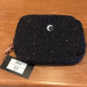 Compact Black Pouch with Red Accents